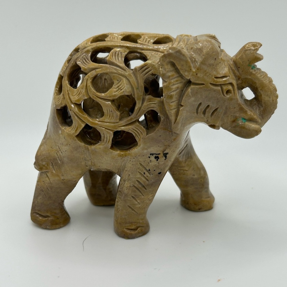 Vintage elephant figurine with baby inside hollow hand carved 3 x 2” trunk up
